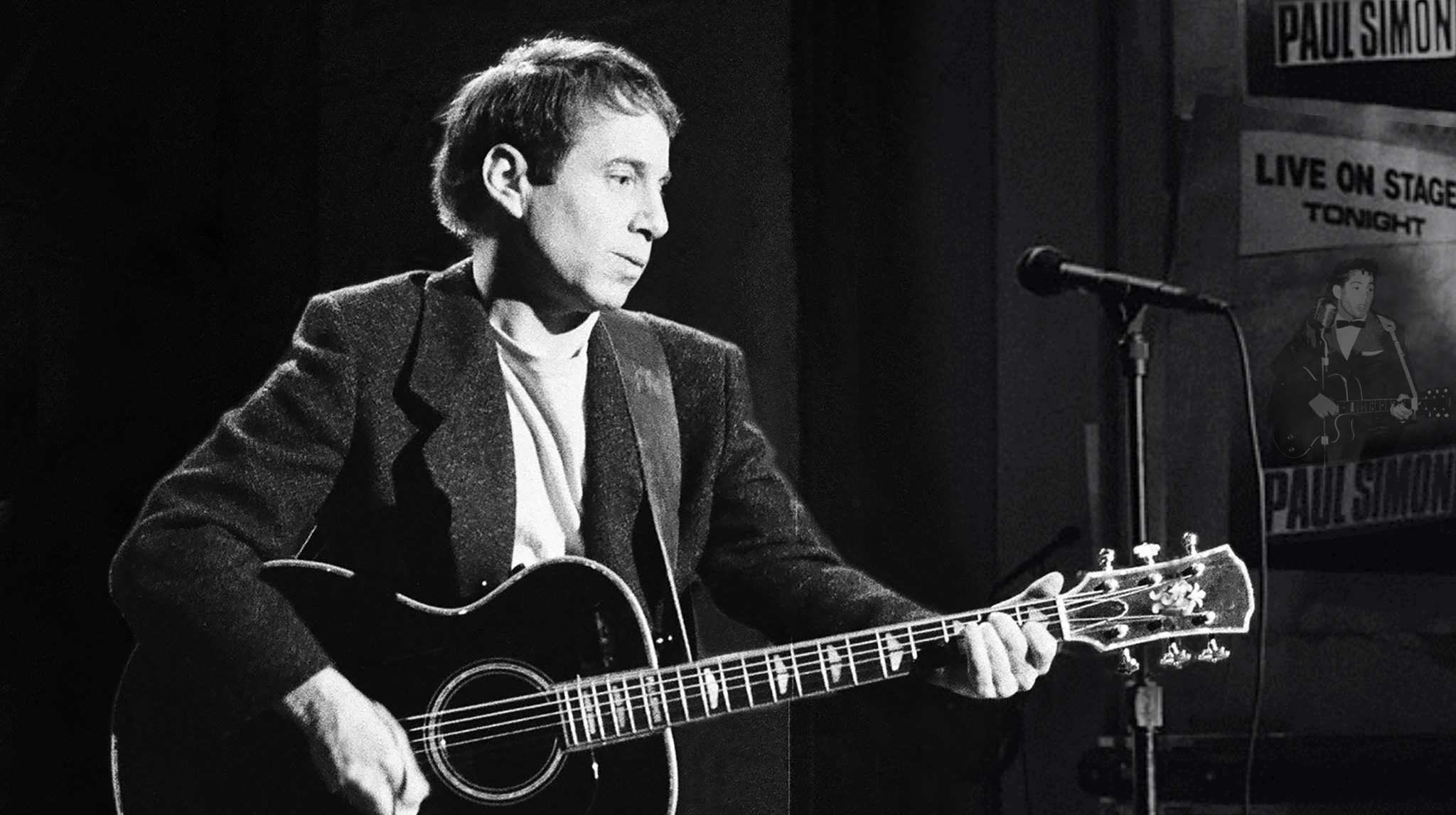 A black and white photo of a young Paul Simon holding a guitar